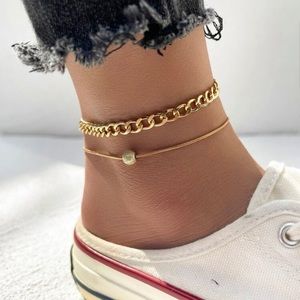 NEW in packages. 6 anklets or bracelets.